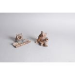 Two early 20th century German Black Forest carved pine bears, one with hinged head as an inkwell and