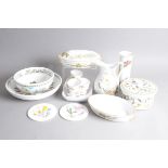 A group of Royal Worcester Evesham pattern items and Portmerion Pottery Botanic Garden items