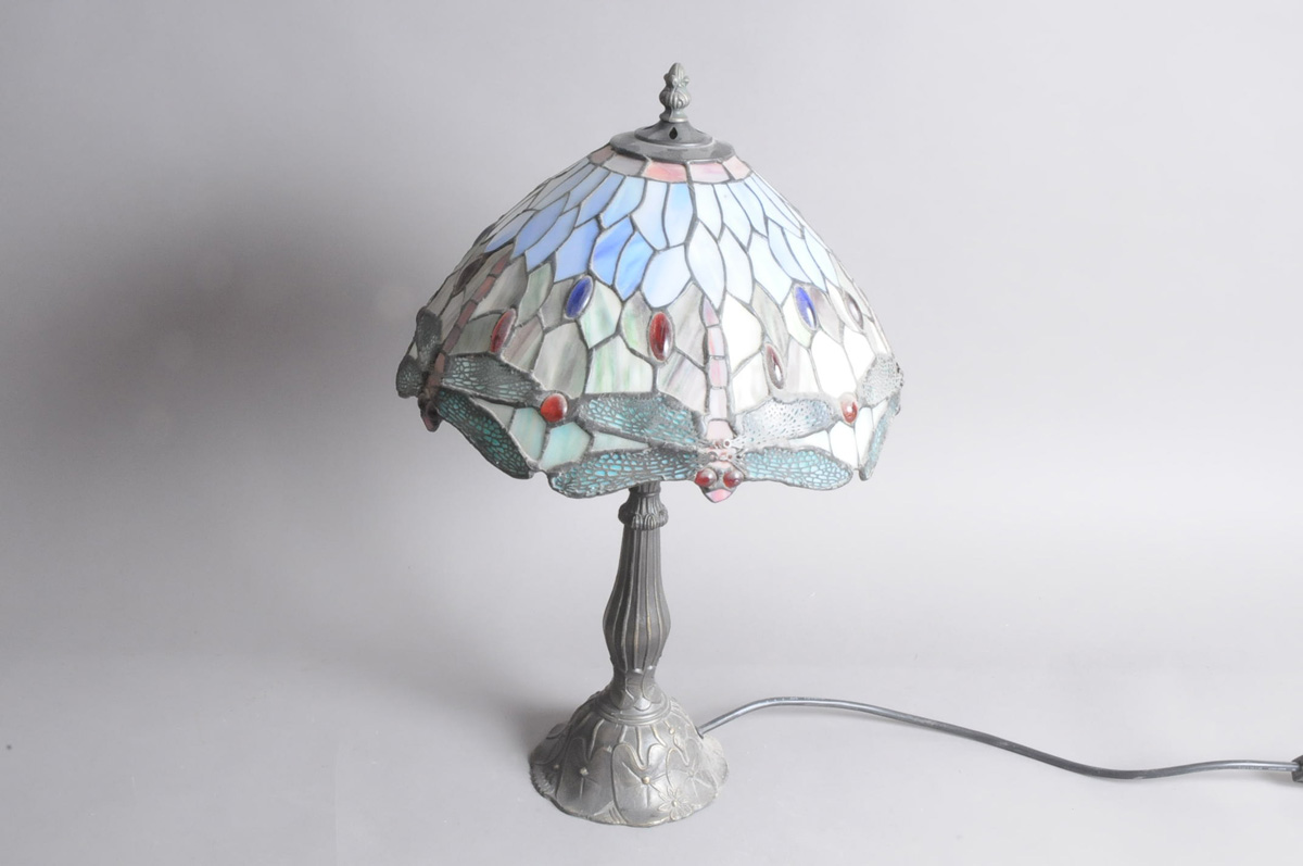 A modern brass and glass lamp, in the style of Tiffany, 50cm