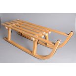 A vintage wooden sledge by Criterion, 90cm