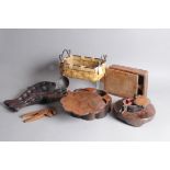 Seven vintage hard wood artifacts, including a fish shaped item with hinges opening to reveal