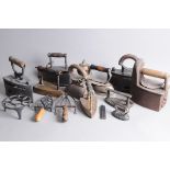 A collection of nine antique and early 20th century irons, one a Parisienne No.5, together with some