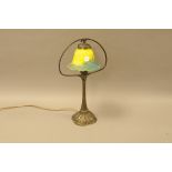 A modern Art Nouvea style lamp, 45cm, brass with glass shade