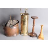 A Victorian copper coal scuttle, complete with wood, together with a brass umbrella stand and fire