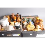 Two boxes of kitchen ceramics, including figural jars, three duck tureens, a chef biscuit barrel,