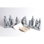 A set of six modern slate style figures, tallest 26cm, with leaflet titled "Proud Moments - a