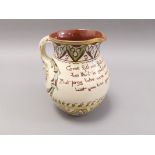 A first half 20th century Aller Vale pottery jug, with cream glaze and sgraffito decoration, with