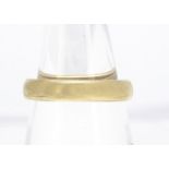 An 18ct gold wedding band, of D shape, ring size N, 5.5g