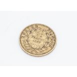 A 19th Century French 20 Francs gold coin, dated 1857, VF, 6.5g