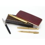A Lady's Sheaffer gilt fountain pen and pencil set in case, together with two further Sheaffer