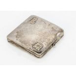 An early 20th Century French silver cigarette case, square and slightly curved, with applied gold