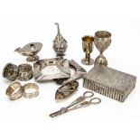 A group of 20th Century silver and white metal collectable items, including a pair of napkin rings