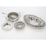 Four items of Victorian and 20th Century silver, including an elliptical pierced dish, a silver