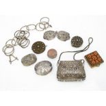 A vintage Middle Eastern filigree purse, together with a silver plated belt buckle and circular link