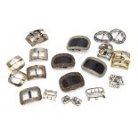 A good collection of Georgian and later shoe and belt buckles, including two silver belt buckles,