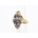 An early 20th Century navette shaped sapphire and diamond dress ring, with alternating gems all in