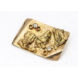 An 18ct gold diamond contemporary rectangular brooch, set with two old cut diamonds within a