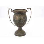 A late Victorian silver trophy, dented and damaged, 12.6ozt, with twin handles