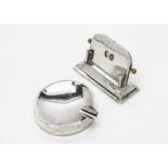 An Art Deco desk perpetual calendar and cigar ashtray, the calendar sloped with filled base,