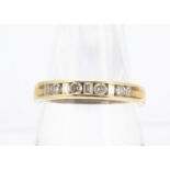 An 18ct gold diamond half hoop eternity ring, with alternating brilliant cuts and baguettes into the