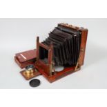 A Pearson & Denham Whole Plate Mahogany Field Camera, circa 1890, body F, square-cornered maroon