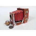 A Lancaster Aluminium-Mounted Instantograph Quarter-Plate Mahogany Field Camera Body, red square-