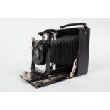 A Contessa Nettel Tessco Quarter-Plate Folding Plate Camera, early 1920s, body G, double