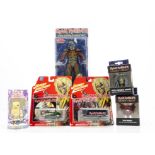 Iron Maiden Memorabilia, six Boxed figures and vehicles comprising a NECA Final Frontier Eddie,