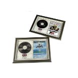 Iron Maiden Presentation Discs, two Framed and Glazed Numbered Presentation CDs comprising Be