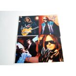 Neil Young / Signatures, four colour promotional photos of Neil Young, all with signatures - various