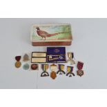 A collection of Masonic jewels, including WW2 era economy issue examples, silver enamel examples,
