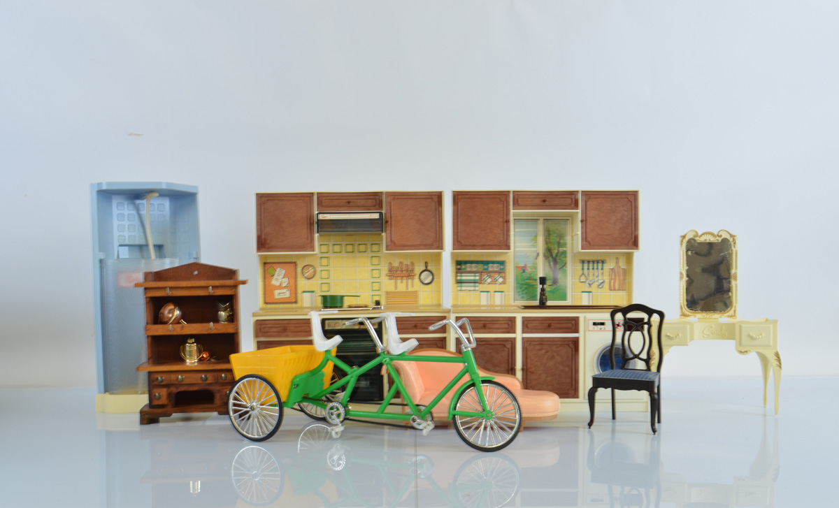 A collection of various Pedigree and Mattell Barbie and Sindy furniture and accessories, including