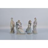 Three Nao porcelain figures, stamped to bases B-23 JU, A-23 A, B-9 JU. Together with a similar
