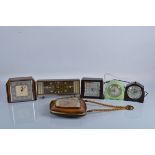 Six wooden and bakelite cased clocks, including Smiths, Rhythm and a German wall clock (6)