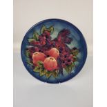 Moorcroft "Finch and Fruit" charger, 35cm diameter.