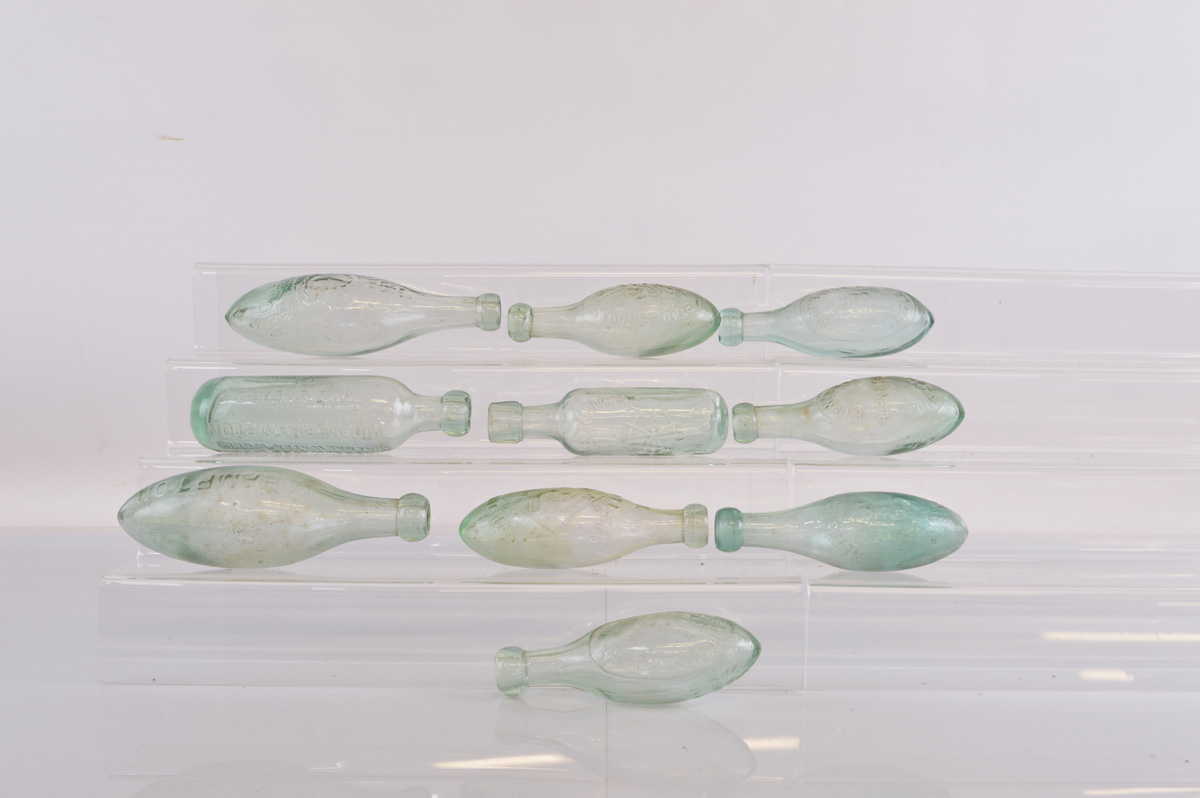 A collection of various Hamilton, Torpedo and other round bottom shaped bottles, from Martyn's,