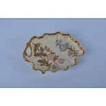 A Royal Worcester leaf dish, shape no 1414 circa 1890, 20cm wide together with three Doulton Burslem