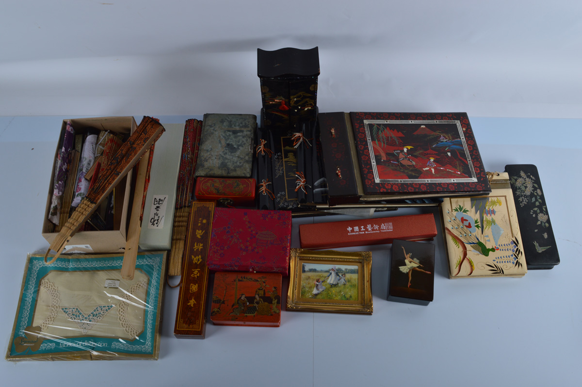 A quantity of Japanese lacquered photograph albums, including table top example with musical