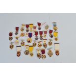 A quantity of gilt metal Masonic Steward jewels, dates range from 1940s to 21st century (31)