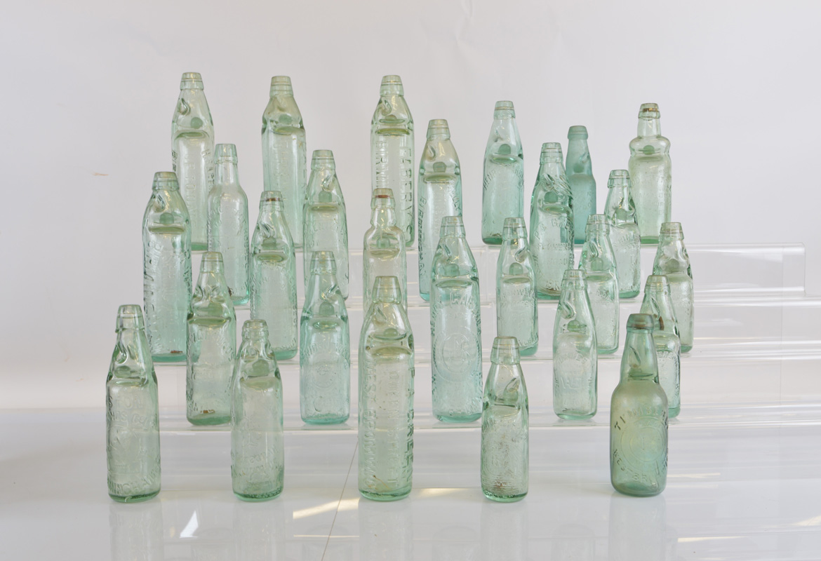 A collection of West Bromwich and Birmingham codd bottles, all in bottle green, various sizes makers