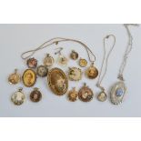 A collection of lockets, mostly open circular design, including an Arts and Crafts example, with