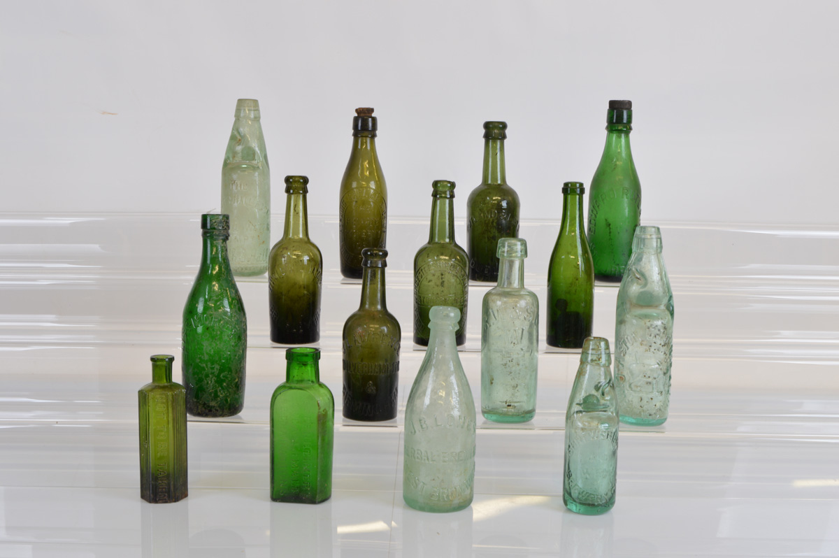 Fifteen various local Black Country codd and other bottles, including The Tetenhall Rock Mineral