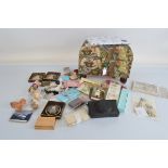 A collection of miscellaneous items, including various small 1900 dolls purses, child's fans,