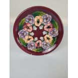 Moorcroft "Pansy" plate, 26cm diameter.