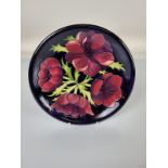 Moorcroft "Anemone "plate, 26cm diameter.