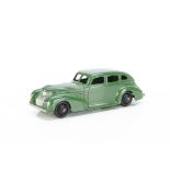 A Dinky Toys 39e Chrysler Royal Sedan, green body, black ridged hubs, silver trim, E