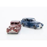 A Dinky Toys 39d Buick Viceroy Saloon, maroon body, black ridged hubs, silver trim, VG, with a fully