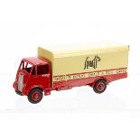 A Dinky Toys 514 Guy 'Spratts' Van, 1st type red cab, chassis and hubs, cream/red van body, VG-E