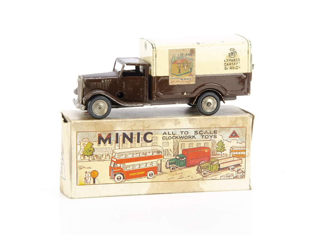 A Tri-ang Minic 79M Tinplate Clockwork G.W.R Delivery Van, brown cab and lower back, cream upper, '