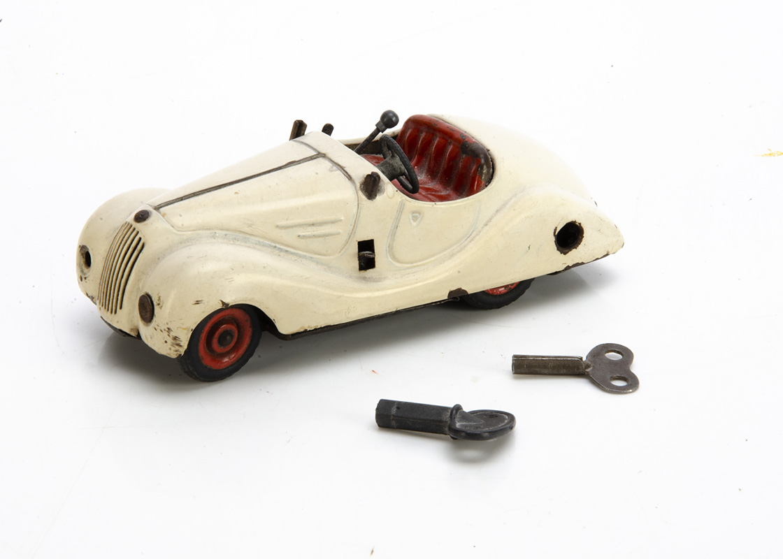 Schuco Examico 4001 Clockwork Car, in white, tested well, two non original keys, F-G, lacks